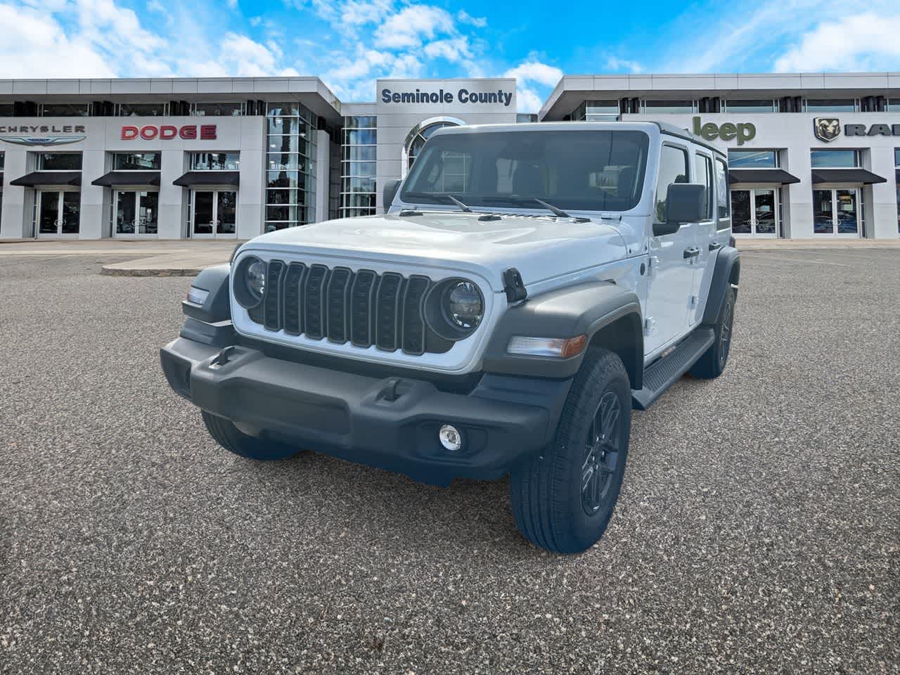 2026 Jeep Wrangler WRANGLER 4-DOOR SPORT S in Bright White Clear-Coat Exterior Paint — front three-quarter view