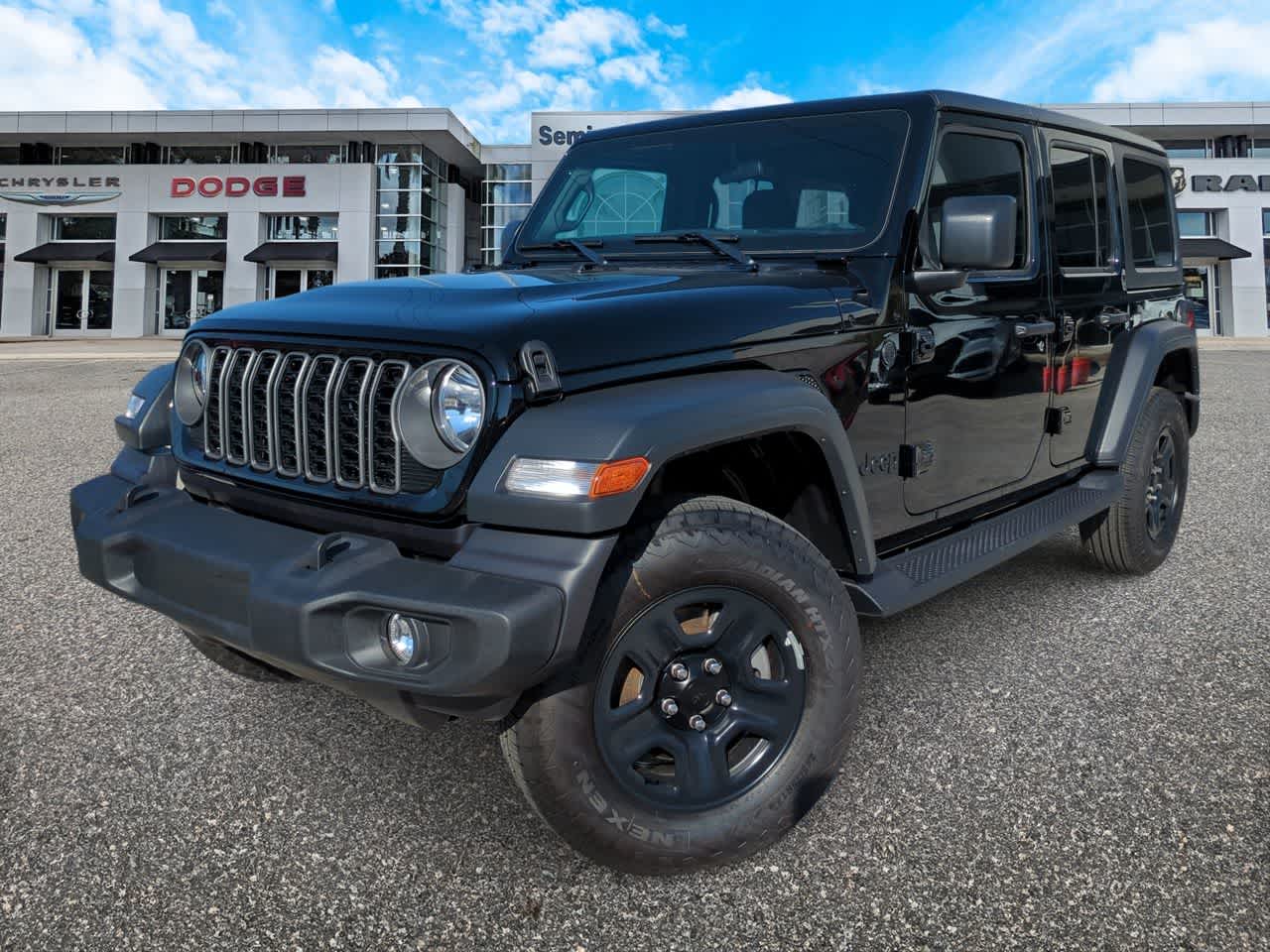 2026 Jeep Wrangler WRANGLER 4-DOOR SPORT in Black Clear-Coat Exterior Paint — front three-quarter view