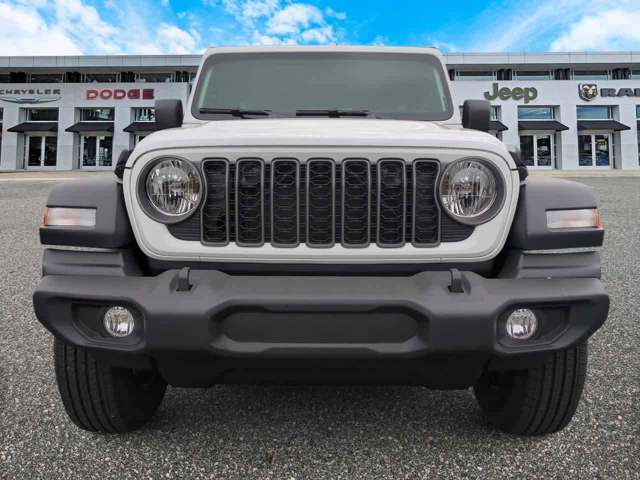 2026 Jeep Wrangler — rear three-quarter view