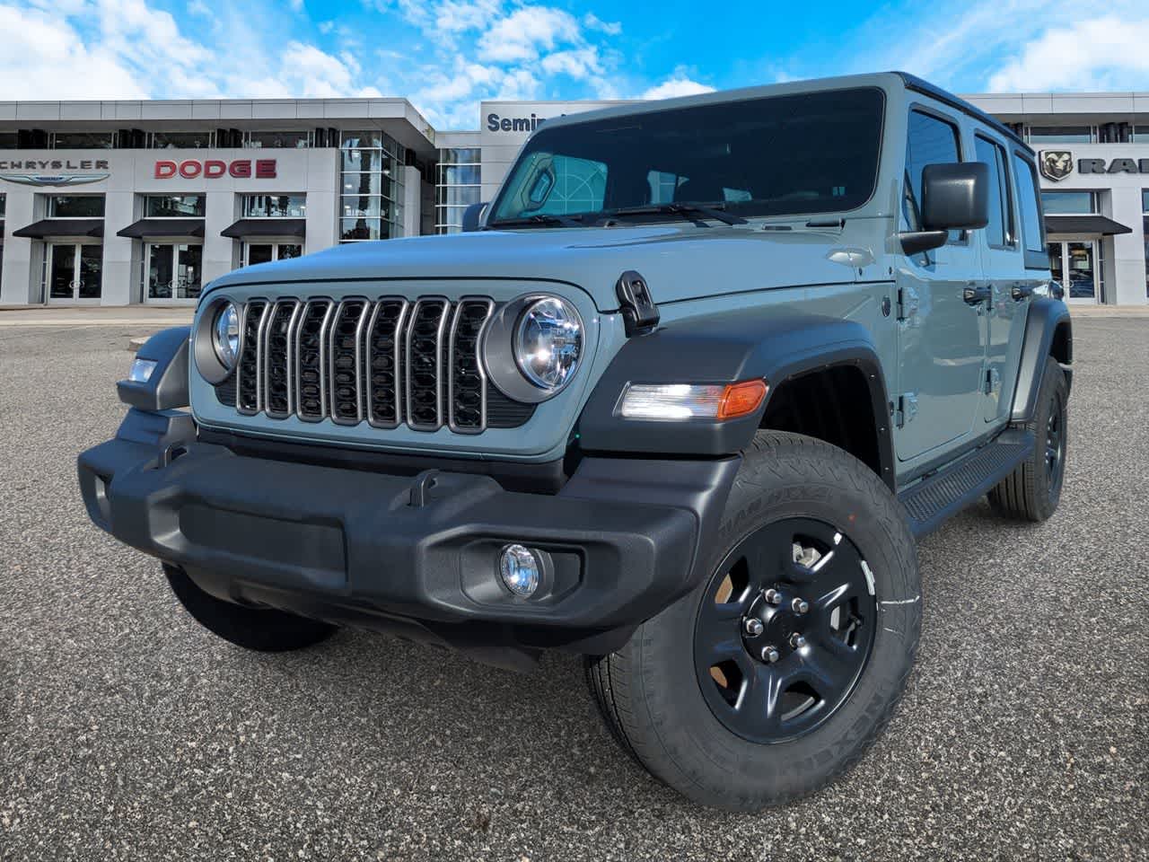 2026 Jeep Wrangler WRANGLER 4-DOOR SPORT in Anvil Clear-Coat Exterior Paint — front three-quarter view