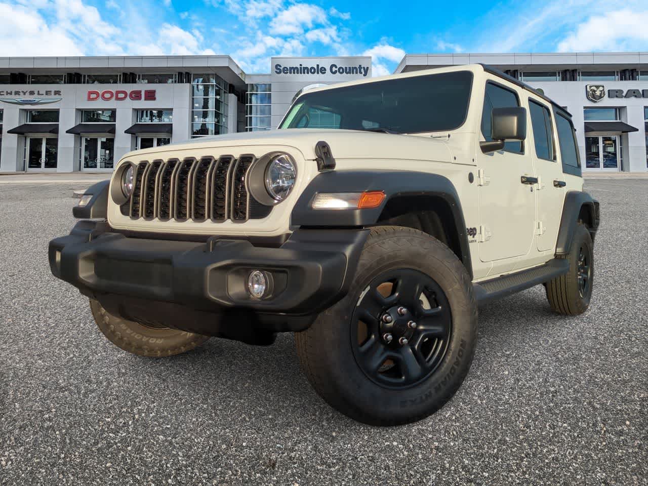 2026 Jeep Wrangler WRANGLER 4-DOOR SPORT in Bright White Clear-Coat Exterior Paint — front three-quarter view