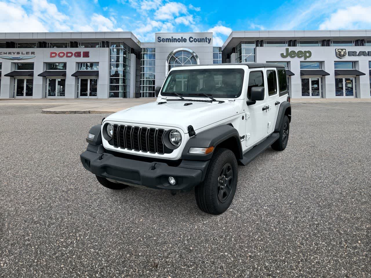 2026 Jeep Wrangler WRANGLER 4-DOOR SPORT in Bright White Clear-Coat Exterior Paint — front three-quarter view