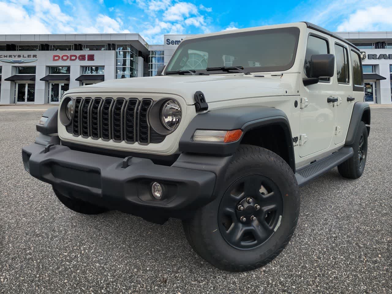 2026 Jeep Wrangler WRANGLER 4-DOOR SPORT in Bright White Clear-Coat Exterior Paint — front three-quarter view