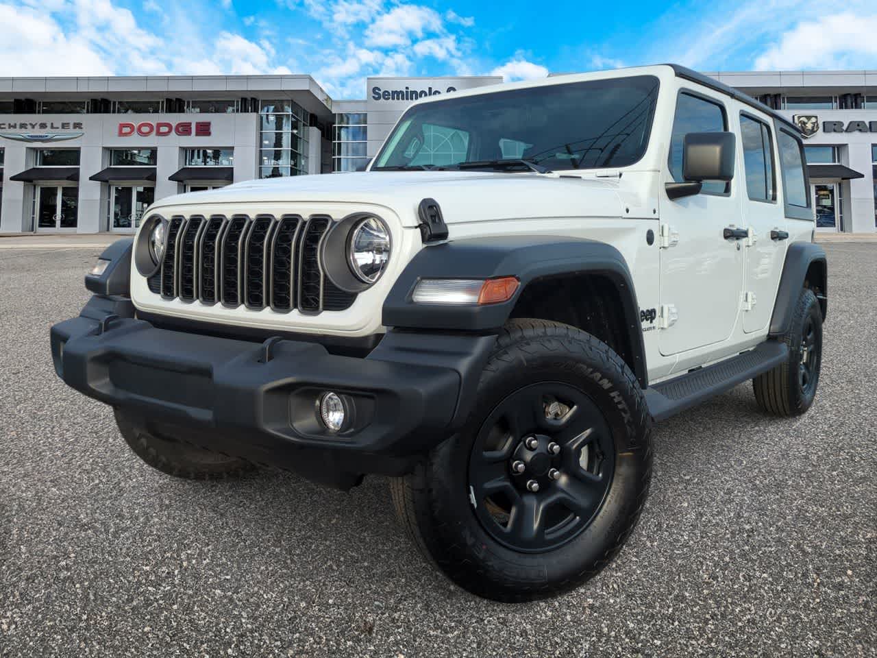 2026 Jeep Wrangler WRANGLER 4-DOOR SPORT in Bright White Clear-Coat Exterior Paint — front three-quarter view