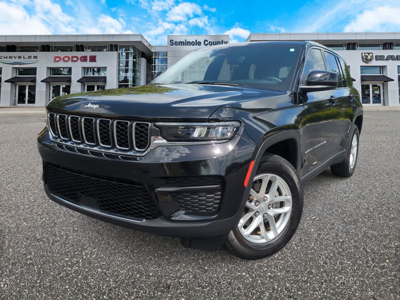 2024 Jeep Grand Cherokee Laredo X 4x4 in Diamond Black Crystal Pearlcoat — front three-quarter view