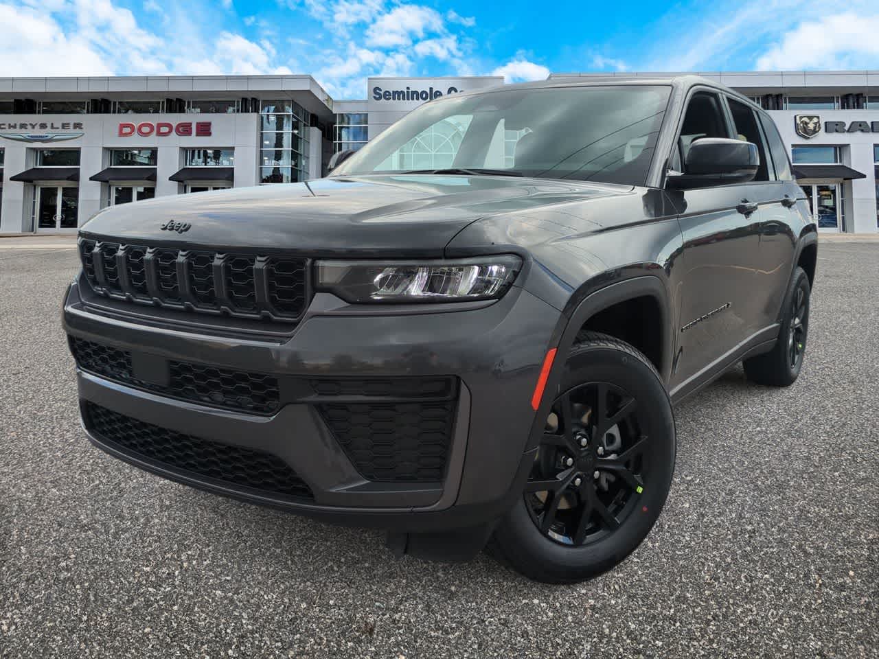 2026 Jeep Grand Cherokee GRAND CHEROKEE LAREDO ALTITUDE 4X4 in Baltic Gray Metallic Clear-Coat Exterior Paint — front three-quarter view