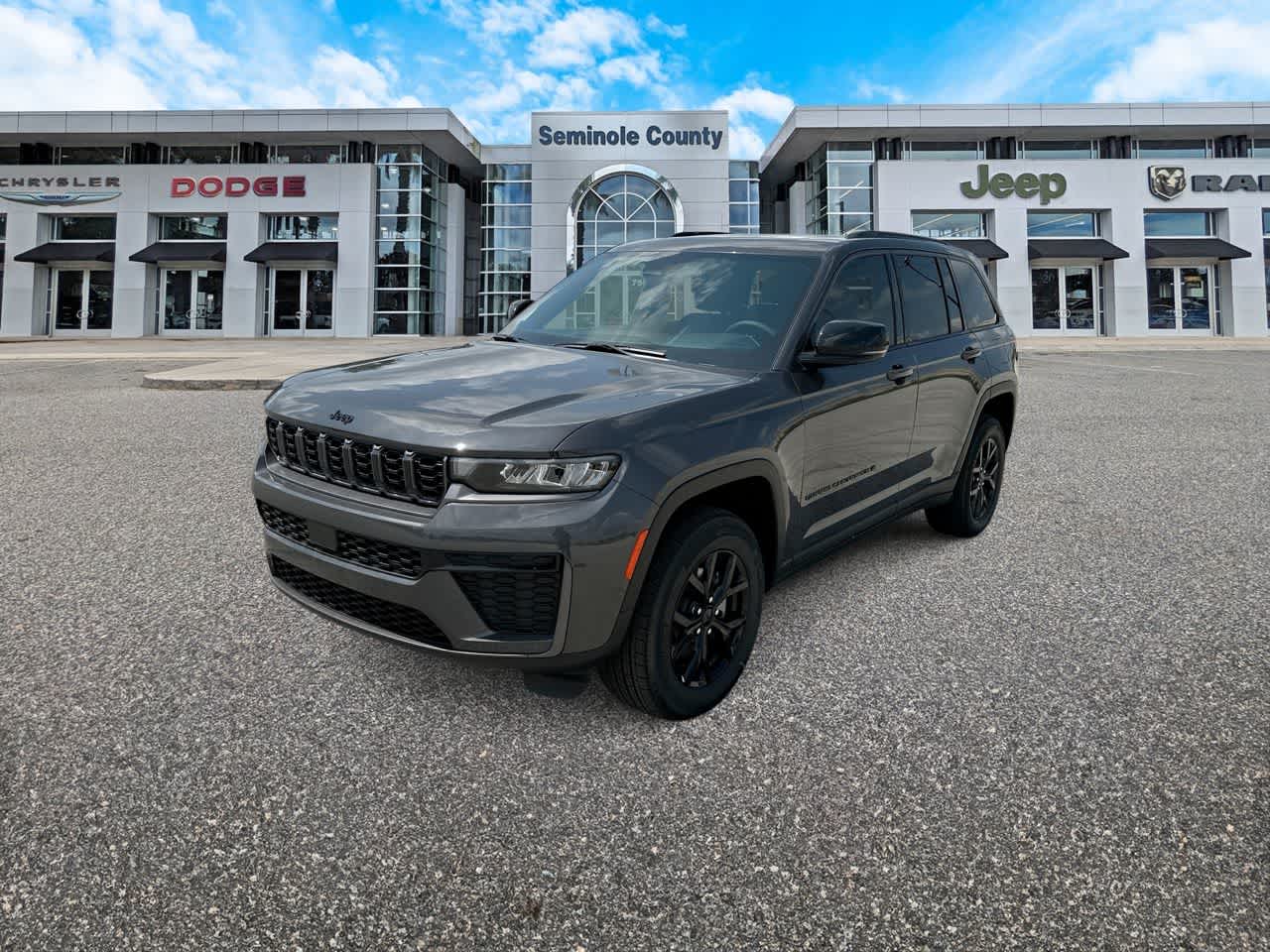 2026 Jeep Grand Cherokee GRAND CHEROKEE LAREDO ALTITUDE 4X4 in Baltic Gray Metallic Clear-Coat Exterior Paint — front three-quarter view