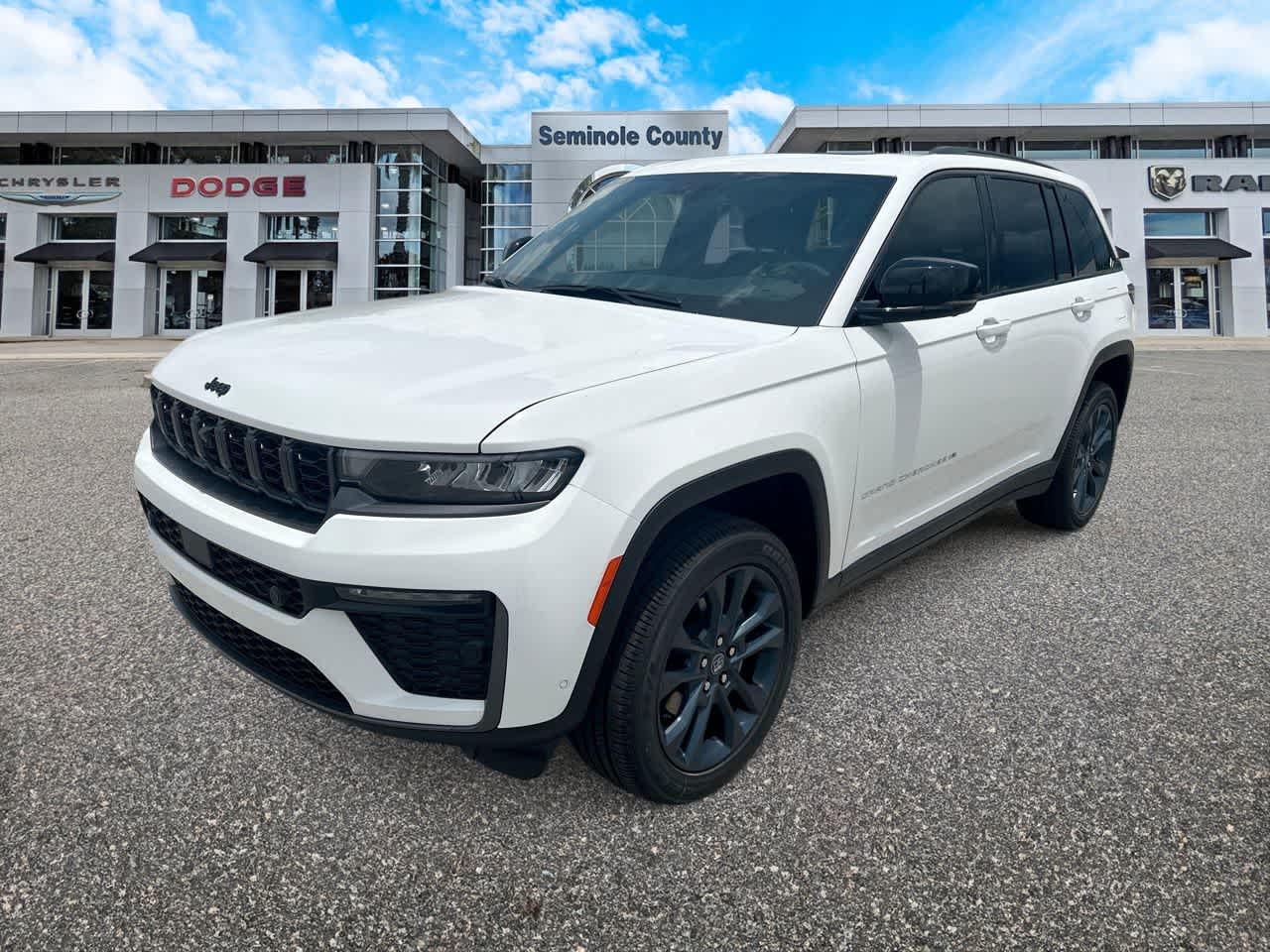 2026 Jeep Grand Cherokee GRAND CHEROKEE 85TH ANNIVERSARY EDITION 4X4 in Bright White Clear-Coat Exterior Paint — front three-quarter view