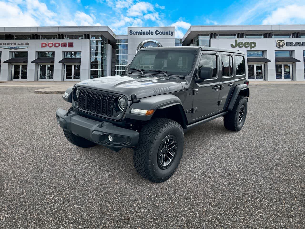 2026 Jeep Wrangler WRANGLER 4-DOOR WILLYS in Granite Crystal Metallic Clear-Coat Exterior Paint — front three-quarter view