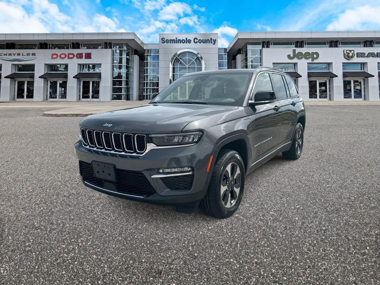 2024 Jeep Grand Cherokee 4xe 4x4 in Baltic Gray Metallic Clearcoat — front three-quarter view