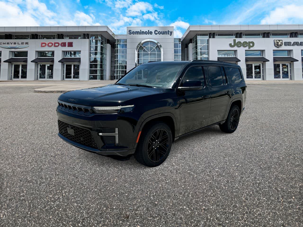 2026 Jeep Grand Wagoneer GRAND WAGONEER LIMITED RESERVE 4X4 in High Gloss Black Exterior Paint — front three-quarter view