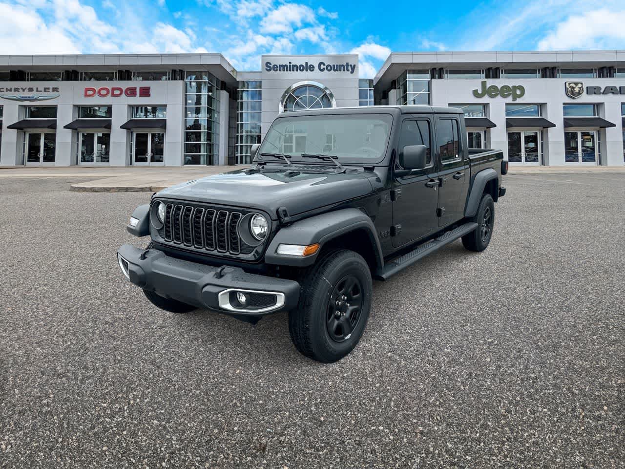 2026 Jeep Gladiator GLADIATOR SPORT 4X4 in Black Clear-Coat Exterior Paint — front three-quarter view