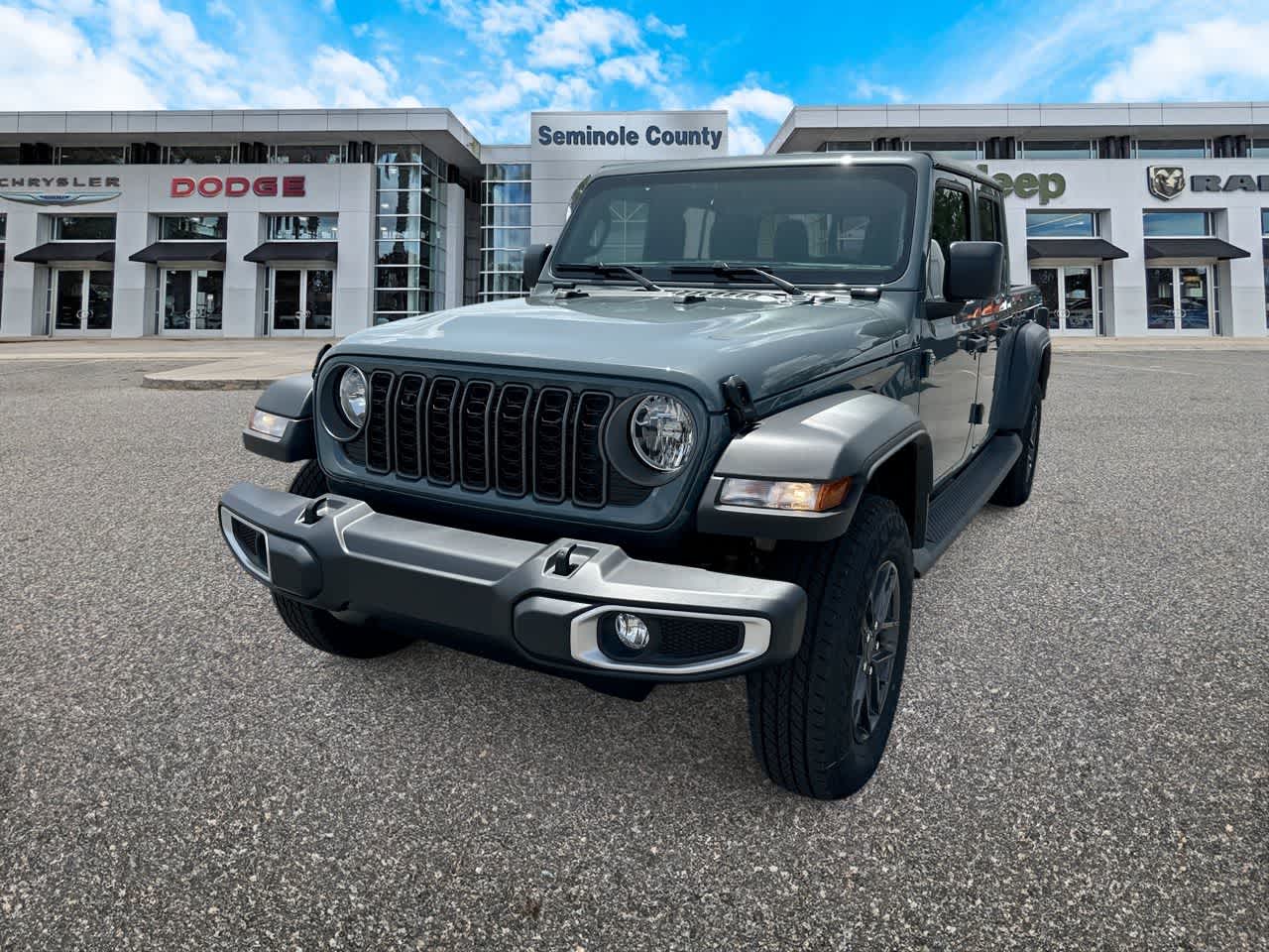 2026 Jeep Gladiator GLADIATOR SPORT 4X4 in Anvil Clear-Coat Exterior Paint — front three-quarter view