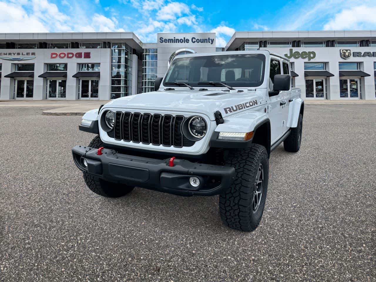 2026 Jeep Gladiator GLADIATOR RUBICON X 4X4 in Bright White Clear-Coat Exterior Paint — front three-quarter view
