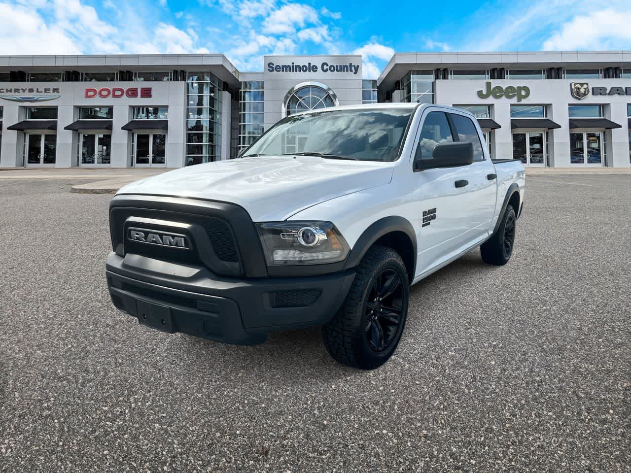 2024 RAM 1500 Classic Warlock Crew Cab 4x2 5'7' Box in Bright White Clearcoat — front three-quarter view
