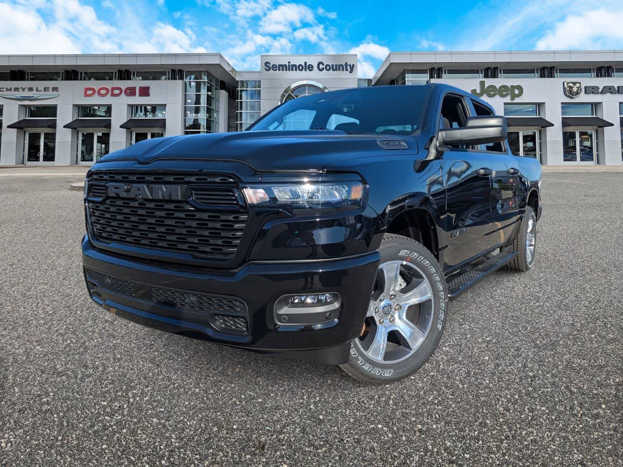 2026 RAM Ram 1500 RAM 1500 EXPRESS CREW CAB 4X2 5'7' BOX in Diamond Black Crystal Pearl-Coat Exterior Paint — front three-quarter view