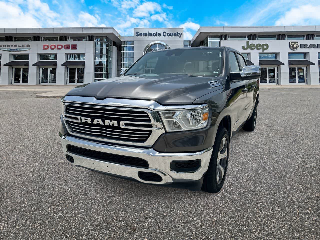 2024 RAM 1500 Laramie Crew Cab 4x2 5'7' Box in Granite Crystal Metallic Clearcoat — front three-quarter view