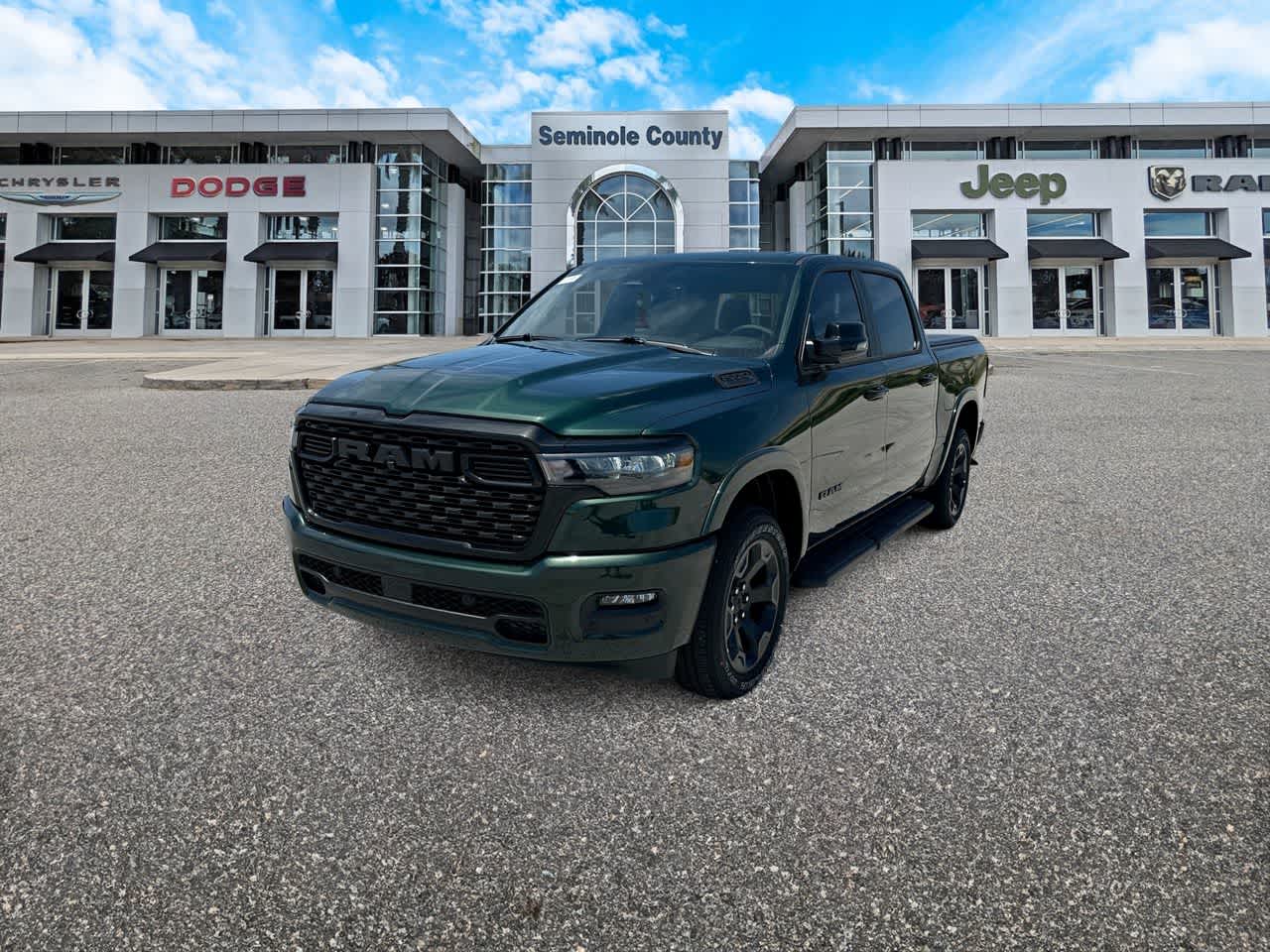 2026 RAM Ram 1500 RAM 1500 BIG HORN CREW CAB 4X4 5'7' BOX in Serrano-Green Metallic Exterior Paint — front three-quarter view