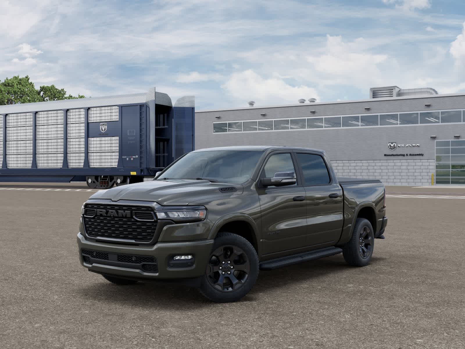 2026 RAM Ram 1500 RAM 1500 BIG HORN CREW CAB 4X4 5'7' BOX in Tank Exterior Paint — front three-quarter view