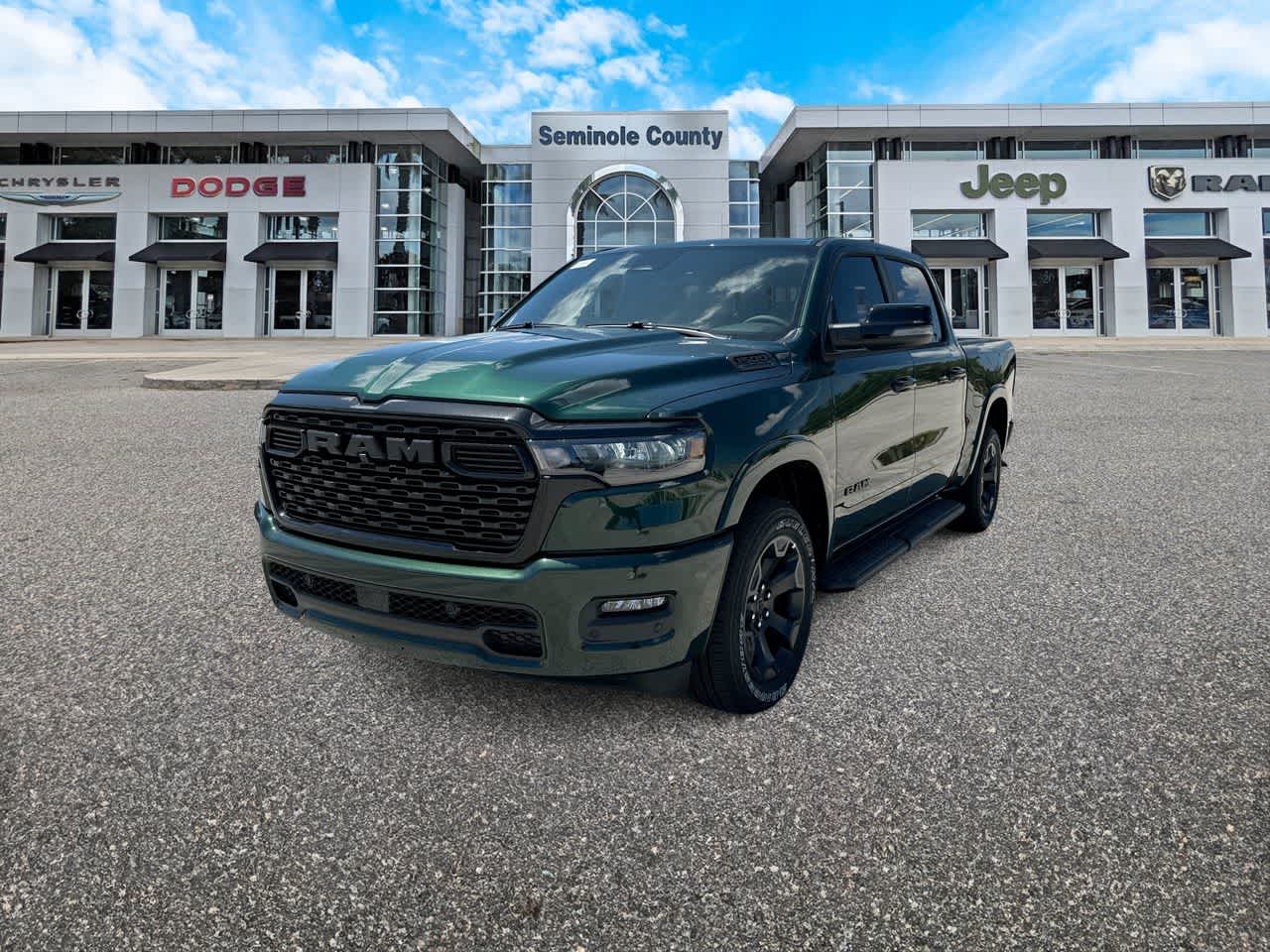 2026 RAM Ram 1500 RAM 1500 BIG HORN CREW CAB 4X4 5'7' BOX in Serrano-Green Metallic Exterior Paint — front three-quarter view