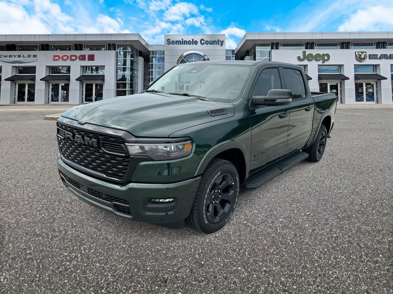 2026 RAM Ram 1500 RAM 1500 BIG HORN CREW CAB 4X4 5'7' BOX in Serrano-Green Metallic Exterior Paint — front three-quarter view