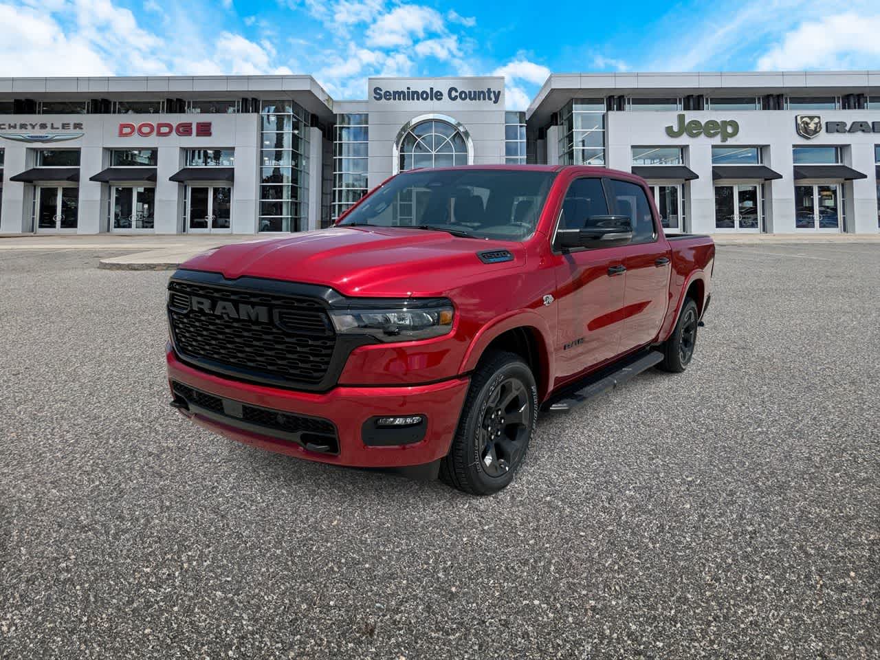 2026 RAM Ram 1500 RAM 1500 BIG HORN CREW CAB 4X4 5'7' BOX in Molten Red Pearl-Coat Exterior Paint — front three-quarter view