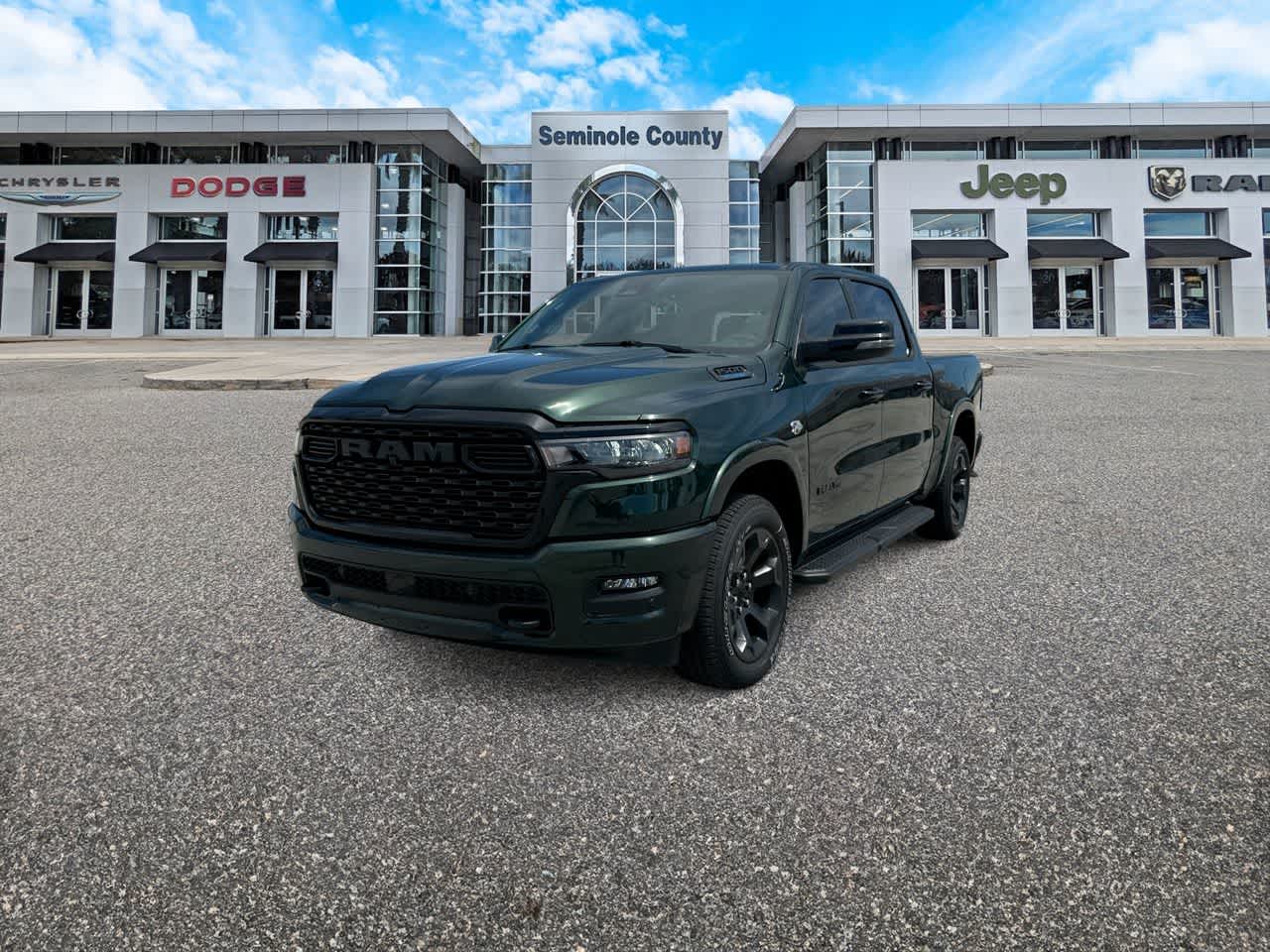 2026 RAM Ram 1500 RAM 1500 BIG HORN CREW CAB 4X4 5'7' BOX in Serrano-Green Metallic Exterior Paint — front three-quarter view