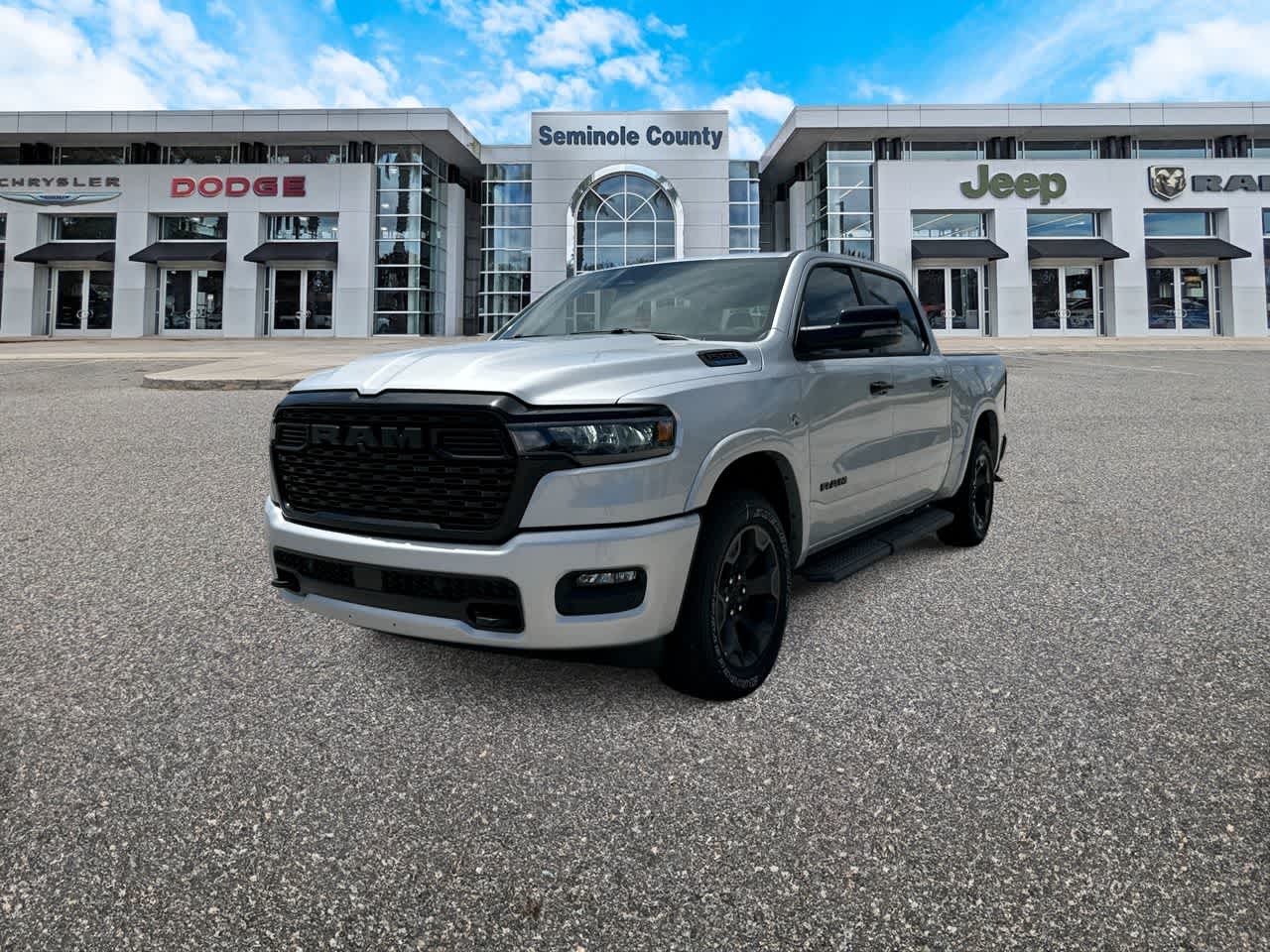 2026 RAM Ram 1500 RAM 1500 BIG HORN CREW CAB 4X4 5'7' BOX in Silver Zynith Exterior Paint — front three-quarter view