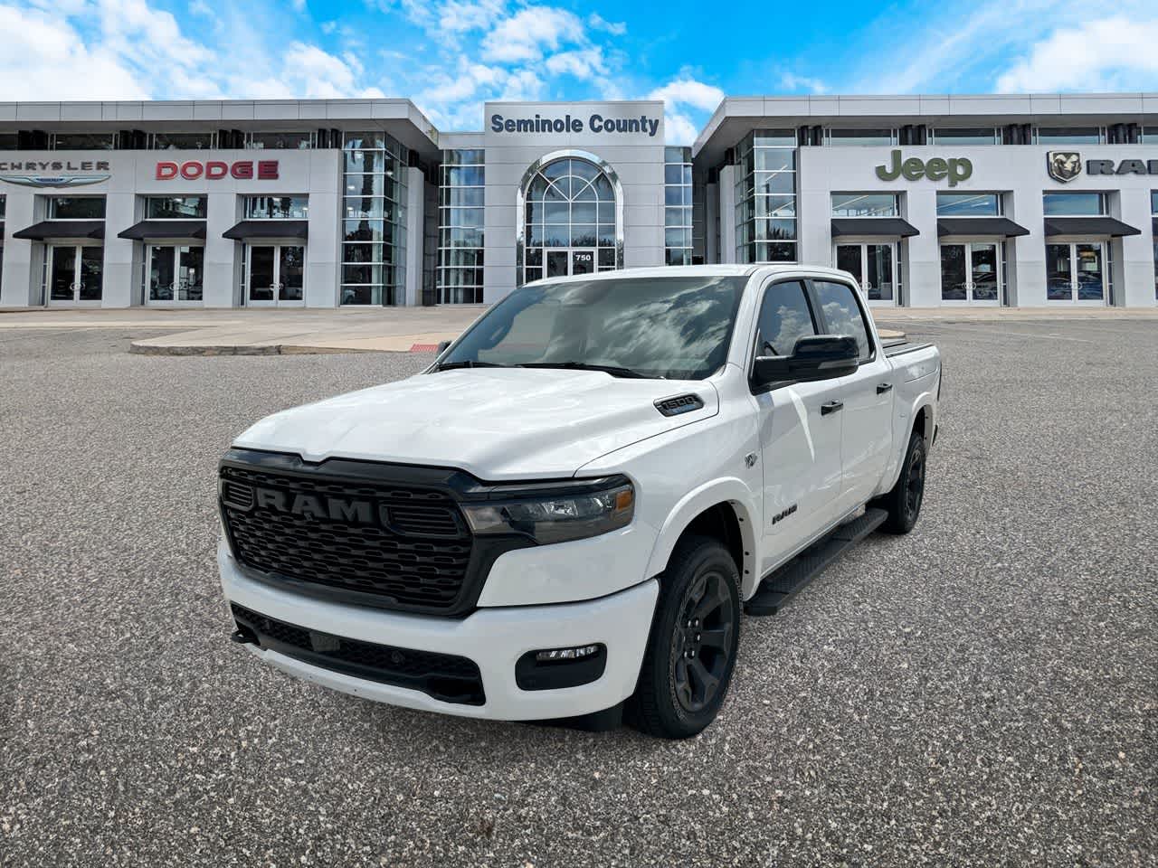 2026 RAM Ram 1500 RAM 1500 BIG HORN CREW CAB 4X4 5'7' BOX in Bright White Clear-Coat Exterior Paint — front three-quarter view