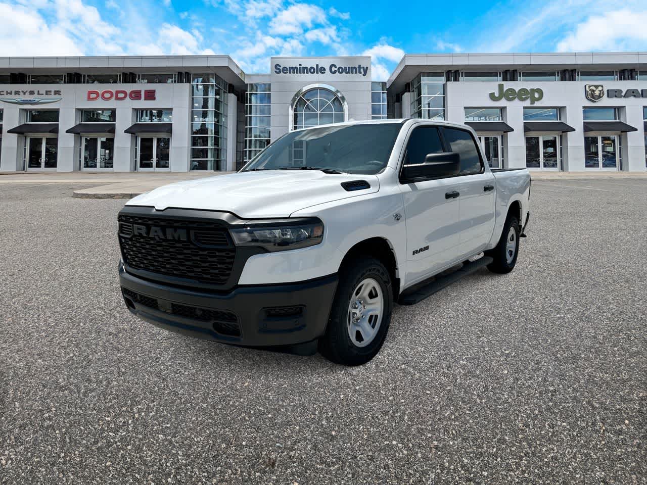 2026 RAM Ram 1500 RAM 1500 TRADESMAN CREW CAB 4X4 5'7' BOX in Bright White Clear-Coat Exterior Paint — front three-quarter view