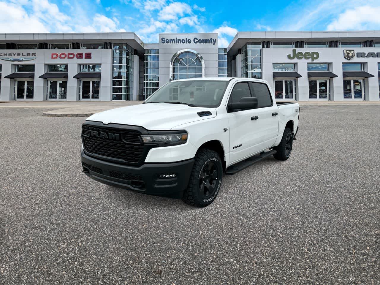 2026 RAM Ram 1500 RAM 1500 WARLOCK CREW CAB 4X4 5'7' BOX in Bright White Clear-Coat Exterior Paint — front three-quarter view