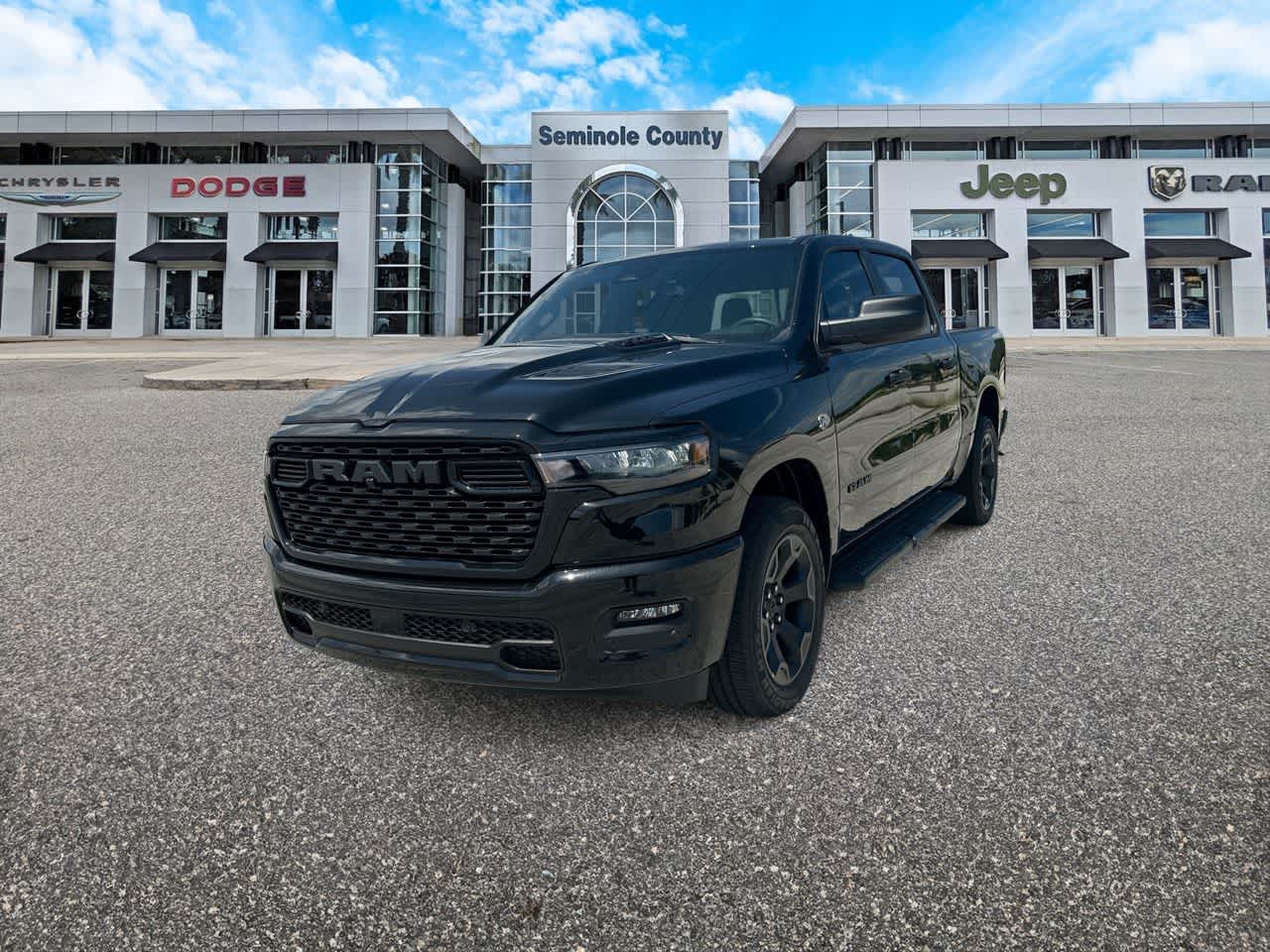2026 RAM Ram 1500 RAM 1500 EXPRESS CREW CAB 4X4 5'7' BOX in Diamond Black Crystal Pearl-Coat Exterior Paint — front three-quarter view
