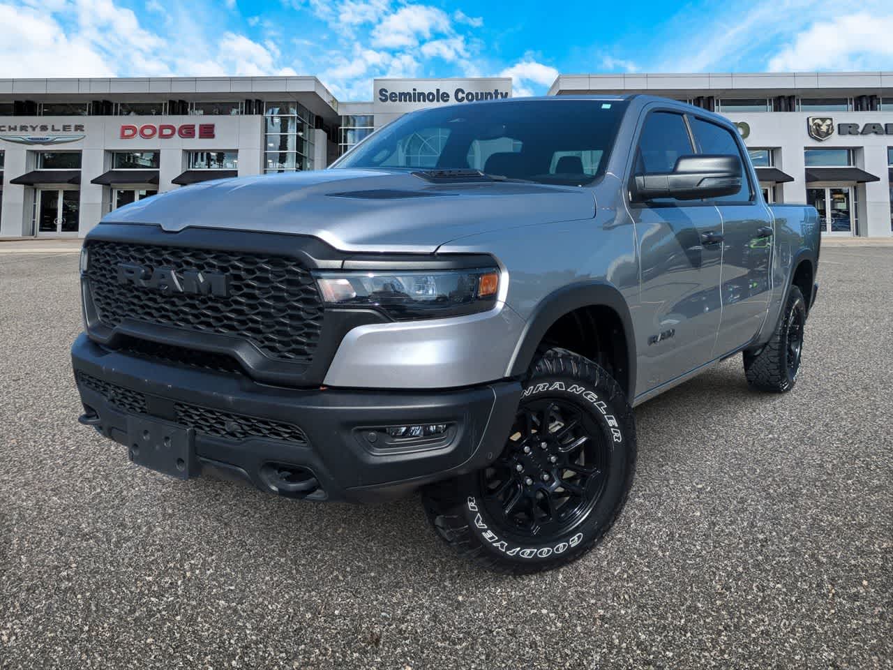 2025 RAM 1500 Rebel Crew Cab 4x4 5'7' Box in Billet Silver Metallic Clearcoat — front three-quarter view