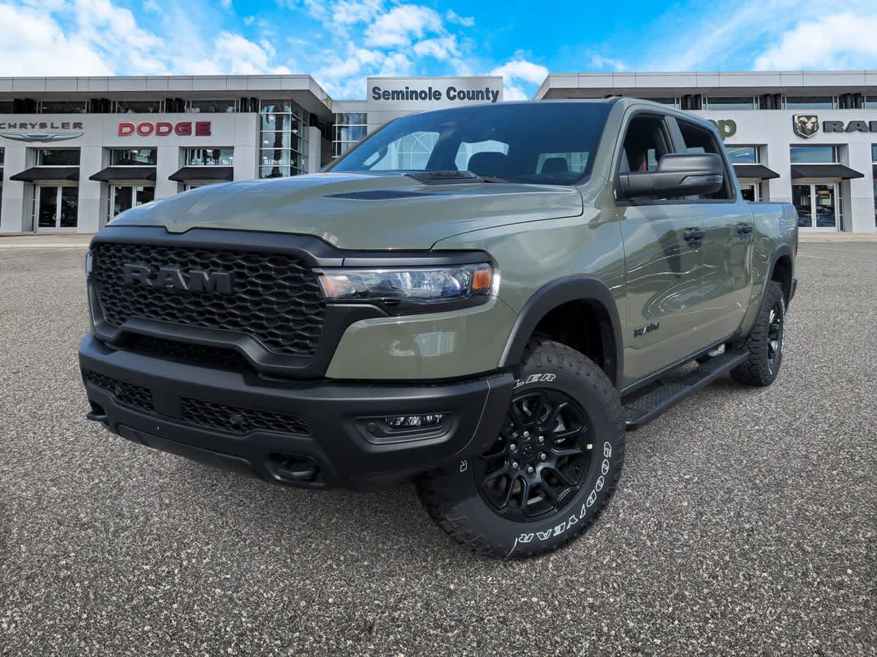 2026 RAM Ram 1500 RAM 1500 REBEL CREW CAB 4X4 5'7' BOX in Canyon Lake Exterior Paint — front three-quarter view