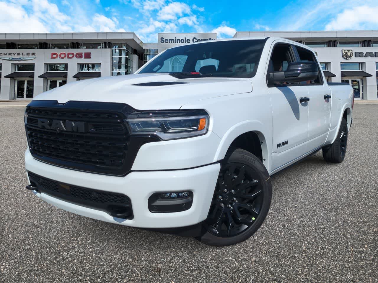2026 RAM Ram 1500 RAM 1500 LIMITED CREW CAB 4X4 6'4' BOX in Bright White Clear-Coat Exterior Paint — front three-quarter view