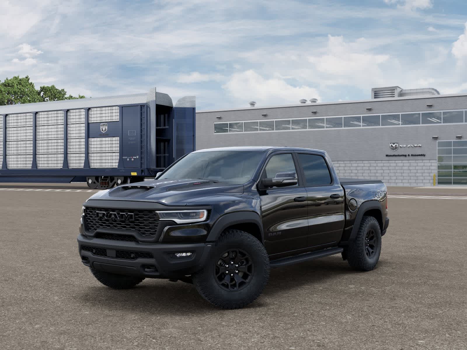 2026 RAM Ram 1500 RAM 1500 RHO CREW CAB 4X4 5'7' BOX in Diamond Black Crystal Pearl-Coat Exterior Paint — front three-quarter view