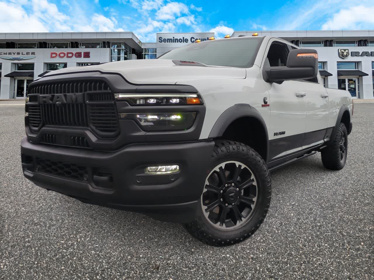 2026 RAM Ram 2500 RAM 2500 REBEL CREW CAB 4X4 6'4' BOX in Bright White Clear-Coat Exterior Paint — front three-quarter view