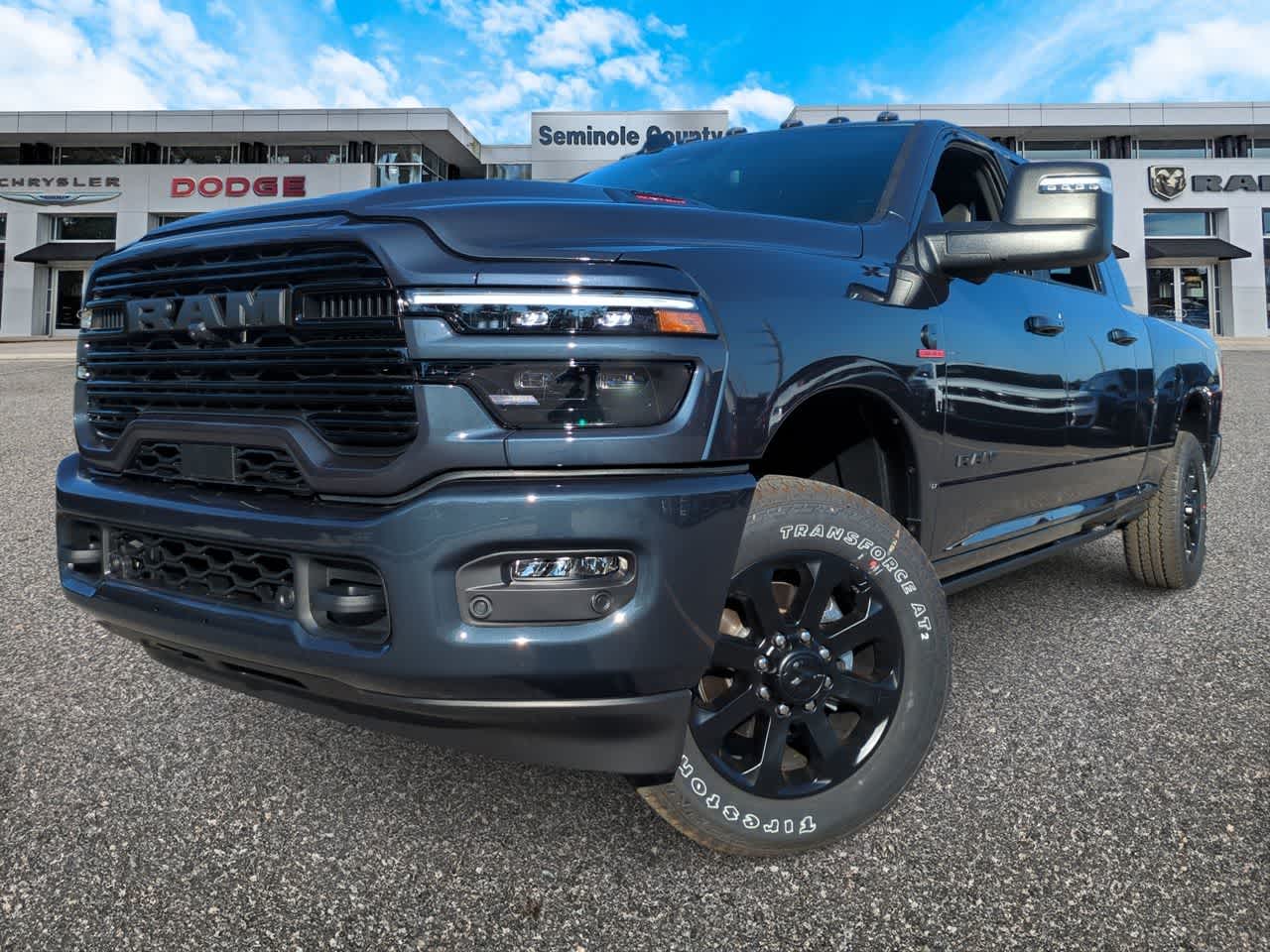 2026 RAM Ram 2500 RAM 2500 LARAMIE MEGA CAB 4X4 6'4' BOX in Forged Blue Metallic Exterior Paint — front three-quarter view