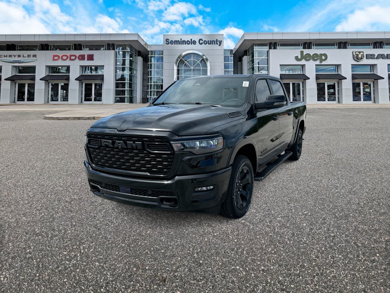 2026 RAM Ram 1500 RAM 1500 BIG HORN CREW CAB 4X4 5'7' BOX in Diamond Black Crystal Pearl-Coat Exterior Paint — front three-quarter view