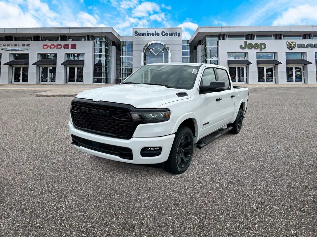 2026 RAM Ram 1500 RAM 1500 BIG HORN CREW CAB 4X4 5'7' BOX in Bright White Clear-Coat Exterior Paint — front three-quarter view