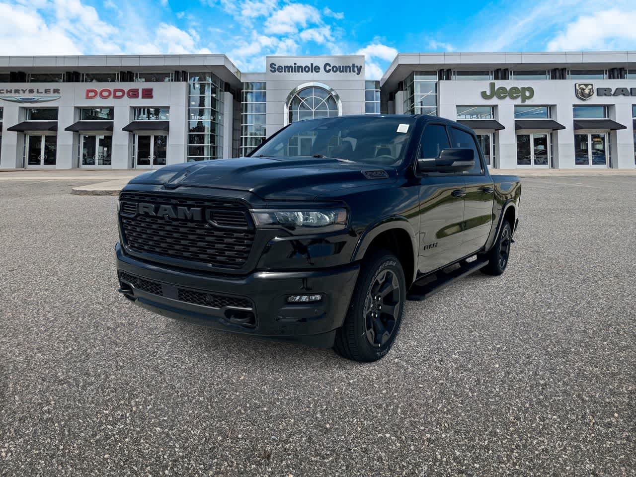 2026 RAM Ram 1500 RAM 1500 BIG HORN CREW CAB 4X4 5'7' BOX in Diamond Black Crystal Pearl-Coat Exterior Paint — front three-quarter view