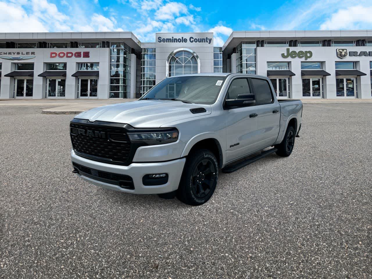 2026 RAM Ram 1500 RAM 1500 BIG HORN CREW CAB 4X4 5'7' BOX in Silver Zynith Exterior Paint — front three-quarter view