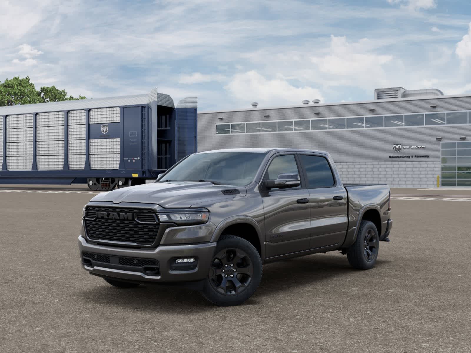 2026 RAM Ram 1500 RAM 1500 BIG HORN CREW CAB 4X4 5'7' BOX in Granite Crystal Metallic Clear-Coat Exterior Paint — front three-quarter view