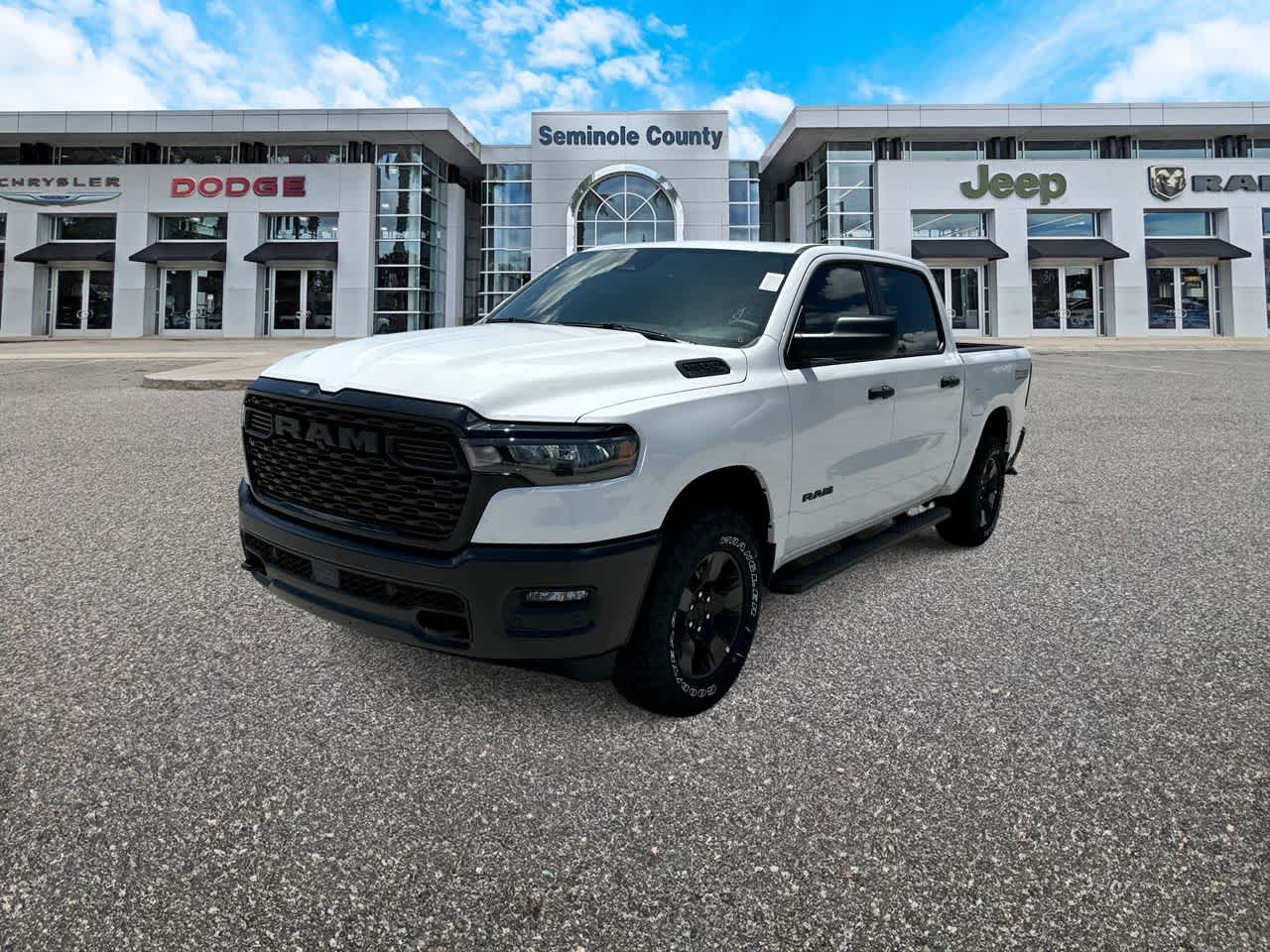 2026 RAM Ram 1500 RAM 1500 WARLOCK CREW CAB 4X4 5'7' BOX in Bright White Clear-Coat Exterior Paint — front three-quarter view