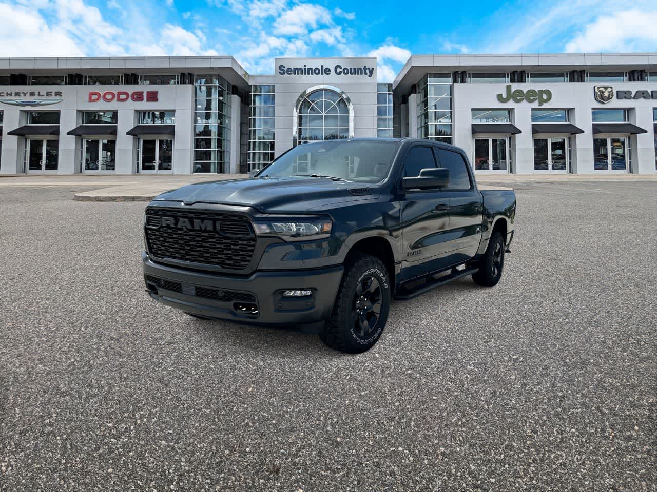 2026 RAM Ram 1500 RAM 1500 WARLOCK CREW CAB 4X4 5'7' BOX in Forged Blue Metallic Exterior Paint — front three-quarter view