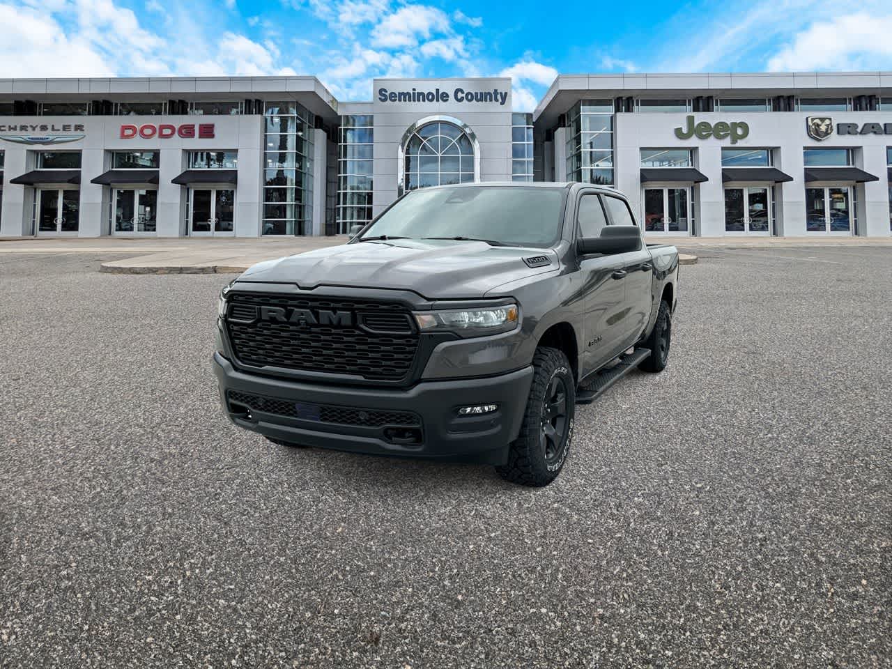 2026 RAM Ram 1500 RAM 1500 WARLOCK CREW CAB 4X4 5'7' BOX in Granite Crystal Metallic Clear-Coat Exterior Paint — front three-quarter view
