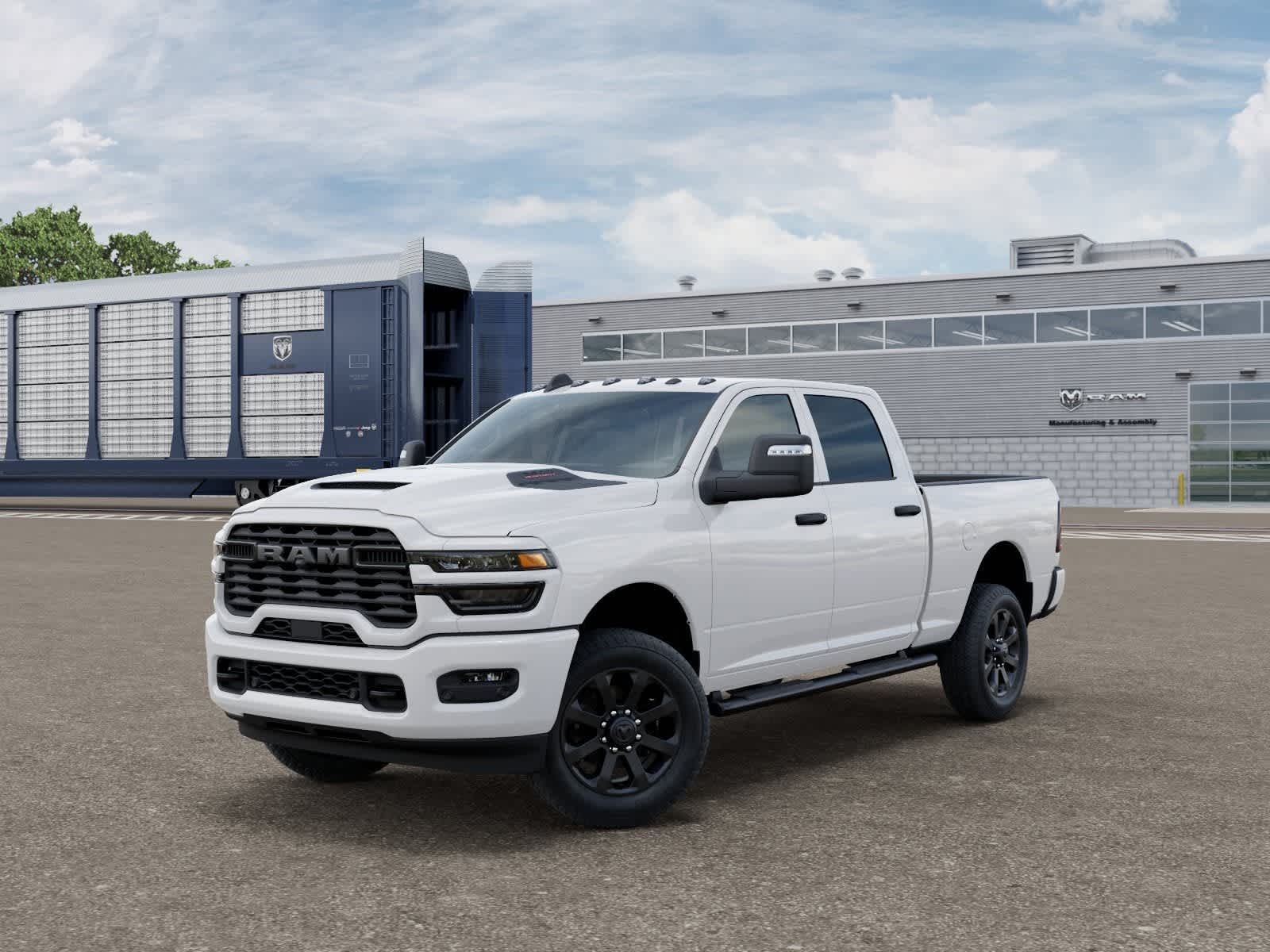 2026 RAM Ram 2500 RAM 2500 BLACK EXPRESS CREW CAB 4X4 6'4' BOX in Bright White Clear-Coat Exterior Paint — front three-quarter view