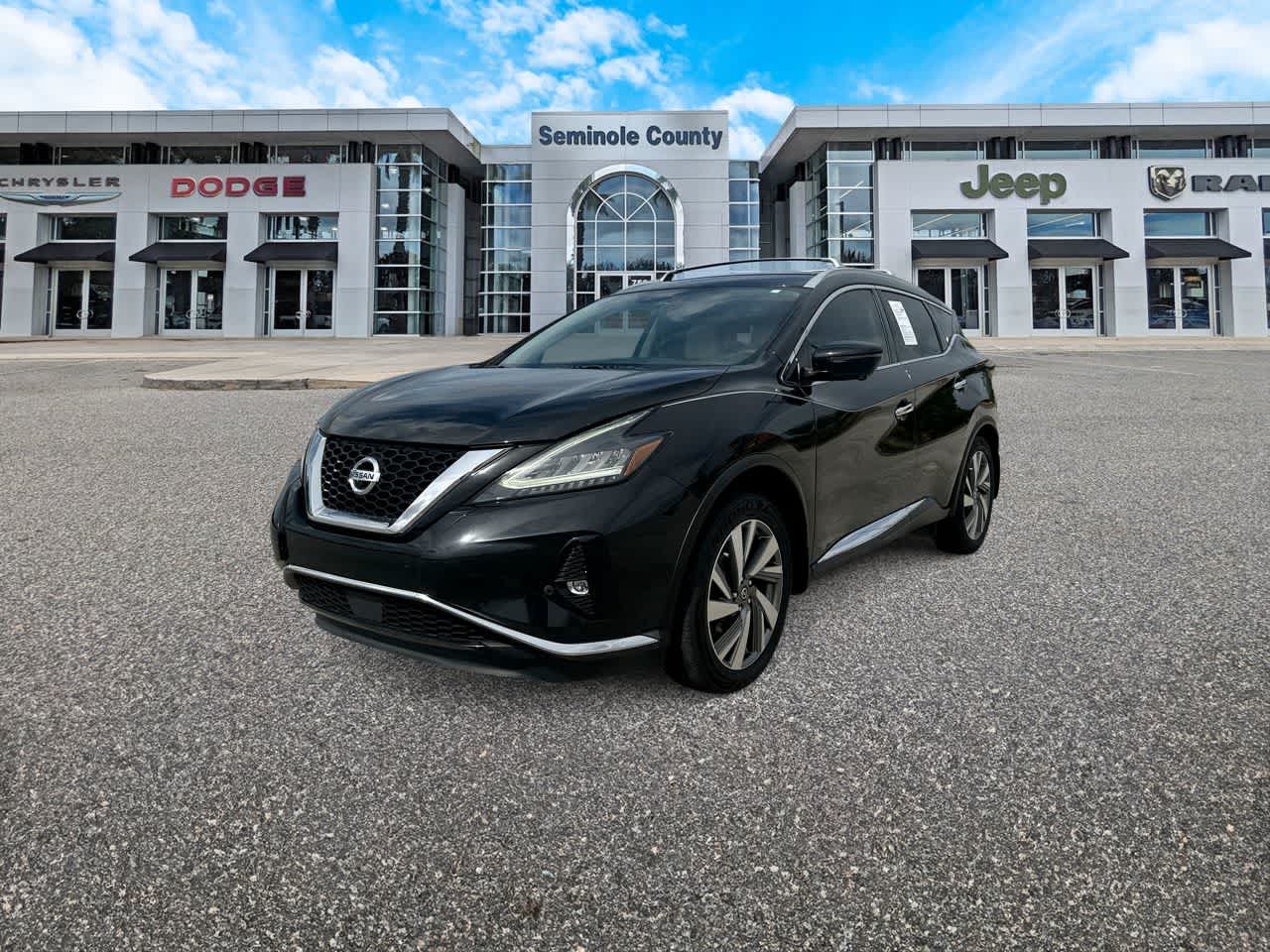 2019 Nissan Murano SL in Magnetic Black Pearl — front three-quarter view