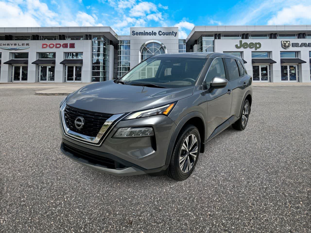 2023 Nissan Rogue SV FWD in Gun Metallic — front three-quarter view