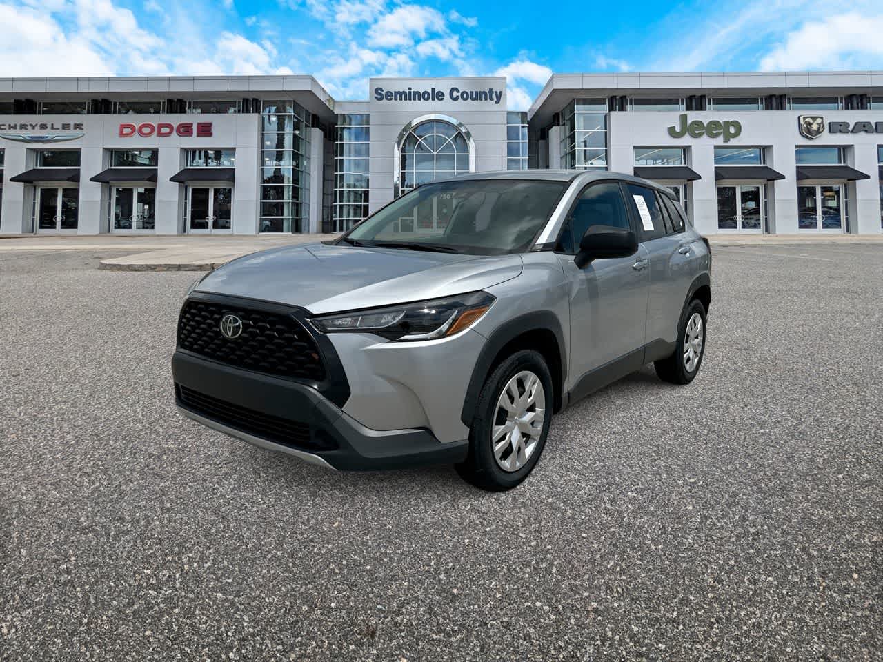 2022 Toyota Corolla Cross L in Sonic Silver — front three-quarter view